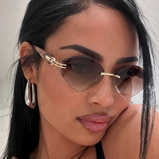 Gafas de sol hexagonales con lentes degradadas y detalles dorados